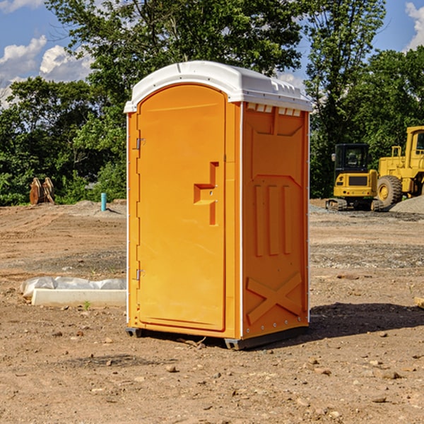 what is the cost difference between standard and deluxe portable restroom rentals in Colwyn